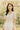 Light cotton crochet top with open sleeves, styled soft and minimal for spring days.
