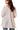 Back view of swing top with breezy silhouette and gathered detail.