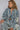 Model front view in urban denim jacket with slouchy, oversized shape