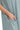 Close-up of sleeve roll and soft stretch fabric