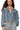 Front view of dusty blue denim jacket with multiple zippers and dropped shoulders