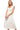 Front view of tiered midi dress with ruffle sleeves and smocked bodice