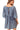 Back view of distressed mini denim dress