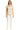 Woman wearing a beige short-sleeve top and white pants on a white background