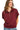 Woman wearing a maroon short-sleeve pullover with a zipper on a white background