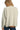 Back view of cream jacquard textured jacket with relaxed tailored finish