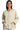 Woman wearing a cream-colored textured jacket on a white background