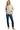 Model wearing cream jacquard jacket with clean front and button details