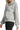 Side view of heather grey jacquard jacket showing pockets and structure