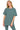 Model wearing ash jade lounge set with short sleeves and leggings.