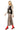Side view of model in embroidered vest with button front and lace detail.