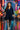 Woman holding umbrella in rainy street, stylish trench navy mini dress