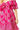 Close-up of hot pink paisley print and ruffle detail on off-shoulder neckline