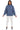 Model front view of blue indigo scuba sweatshirt with quarter zip closure and relaxed design.