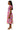 Side view highlighting ruffle trim and dress drape.