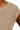 Close-up of ribbed cotton texture and neckline edge on knit vest