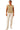 Woman wearing a beige sleeveless top and white pants on a white background