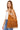 Model wearing light brown suede fringe bag with slouchy hobo shape and minimalist style