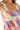 Close-up of tied shoulder ribbon on brushed cotton top